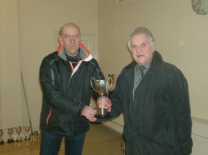 Anthony McDonnell (r) presents the Top Prize-winner award to Jimmy Hanson. 